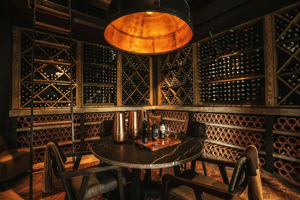 How do I convert an unused basement into a climate-controlled wine sanctuary?
