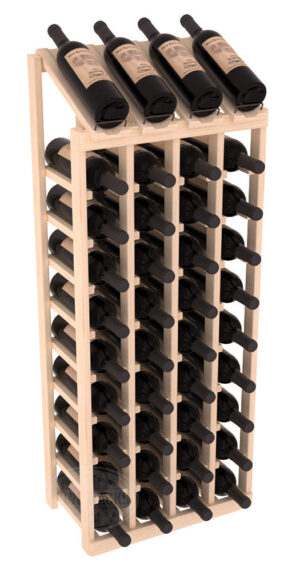 Tall light-wood wine rack with four columns and an angled top shelf holding multiple dark wine bottles.